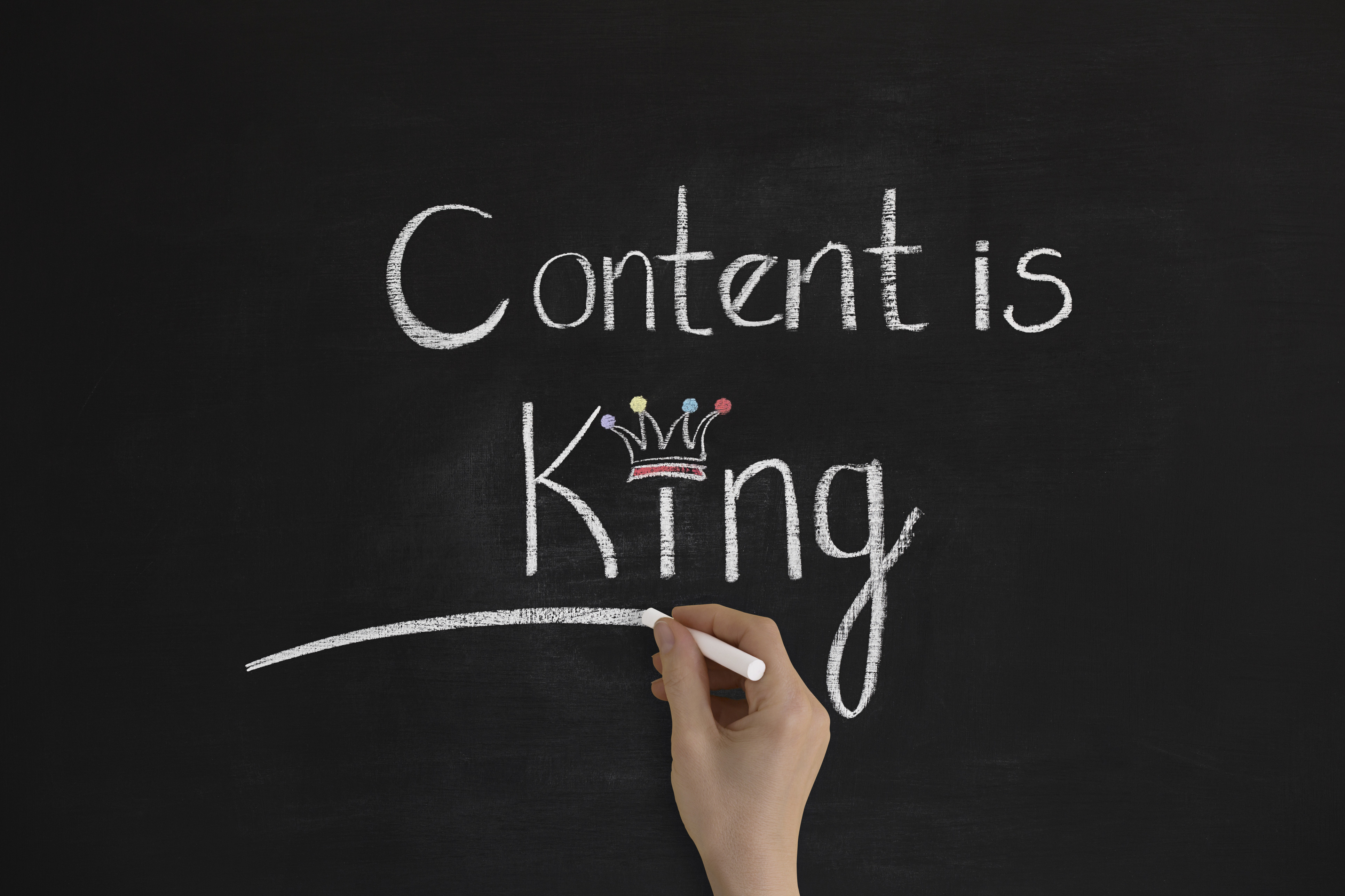 "Content is king" handwritten on chalkboard